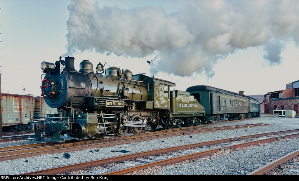 BLW 26 pulling the North Pole Limited westbound through the yard